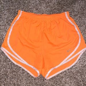 Orange Nike shorts